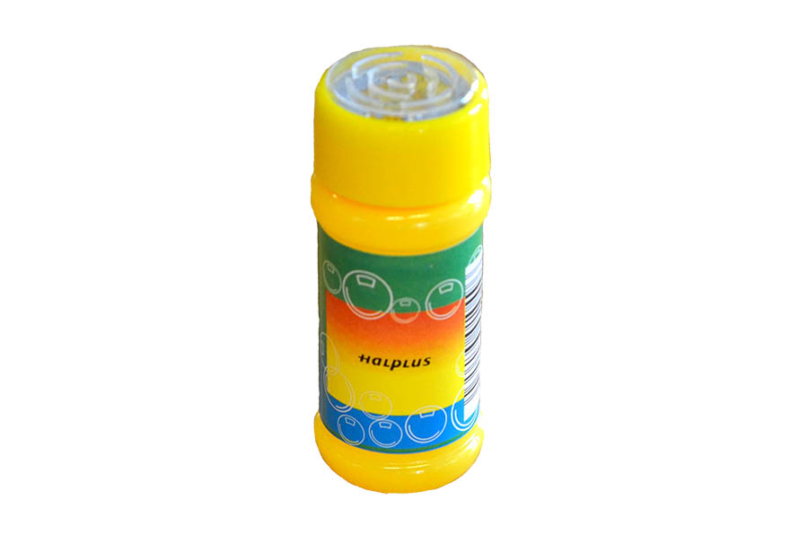 Das Foto zeigt eine bunte Seifenblasenflasche mit gelber Verschlusskappe.